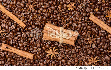 Roasted coffee beans, cinnamon sticks and star anise, full frame Roasted coffee beans, cinnamon sticks and star anise, full frame 112235575