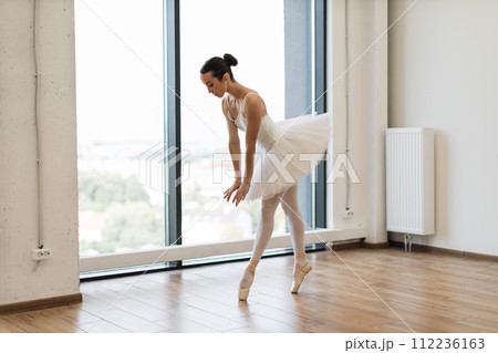 Young Caucasian classical ballet dancer woman in dance class. 112236163