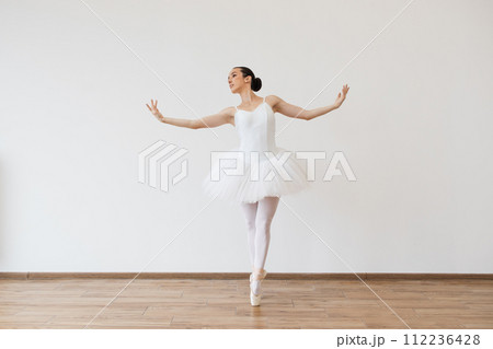Woman in tutu motion, balance flexibility concept, lifestyle. Woman in tutu motion, balance flexibility concept, lifestyle. 112236428
