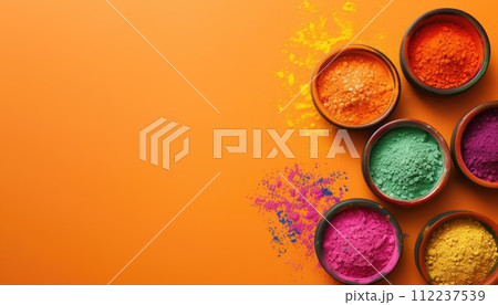 Bowls with colored powder for indian celebration of Holi on warm orange background. Bowls with colored powder for indian celebration of Holi on warm orange background. 112237539
