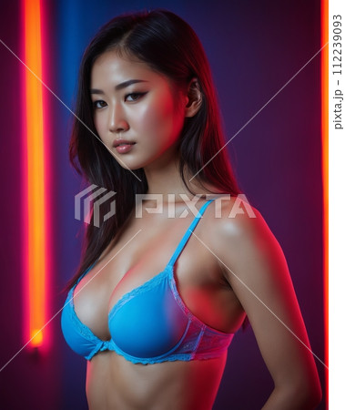 an asian woman in a blue bra top 112239093