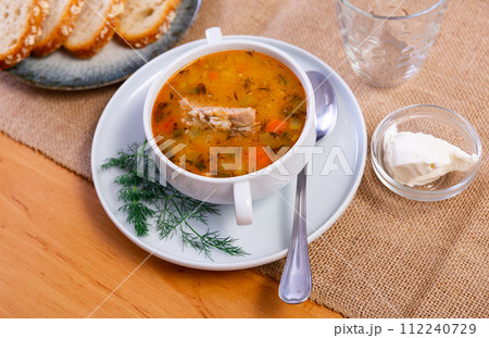 Traditional Russian soup rassolnik made from pickled cucumbers, pearl barley, and beef kidneys Traditional Russian soup rassolnik made from pickled cucumbers, pearl barley, and beef kidneys 112240729