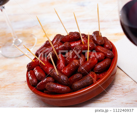Hot mini chorizo sausages 112240937