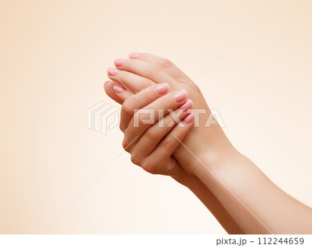 Beautiful Woman Hands. Female Hands Applying Cream Beautiful Woman Hands. Female Hands Applying Cream 112244659