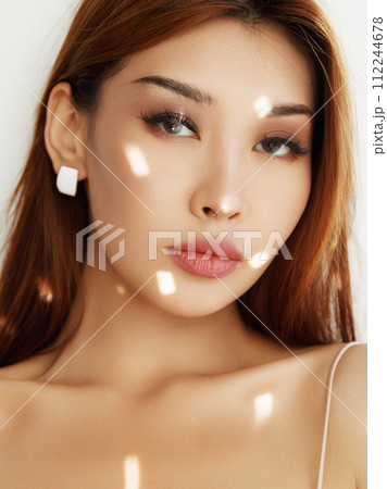 Beautiful young asian woman with clean fresh skin 112244678