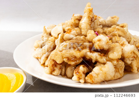 Chinese food with fried pork and sweet and sour sauce Chinese food with fried pork and sweet and sour sauce 112246693