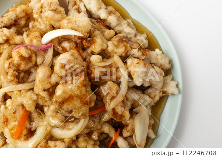 Sweet and sour pork on a white background 112246708