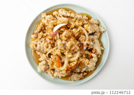 Sweet and sour pork on a white background Sweet and sour pork on a white background 112246712