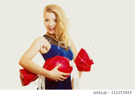 holidays love happiness concept - girl with red gift holidays love happiness concept - girl with red gift 112253843
