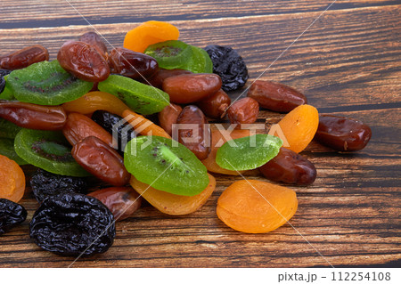 Dry fruits on wood Dry fruits on wood 112254108