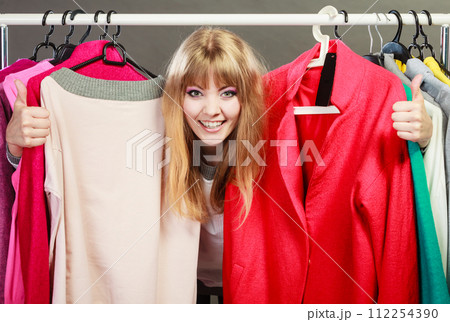 Woman giving thumb up gesture. Woman giving thumb up gesture. 112254390