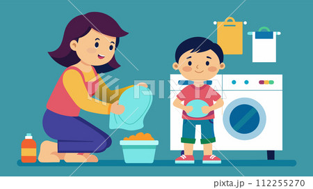 Mother and son doing laundry together in a cozy home 112255270