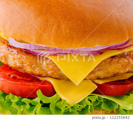 Big hamburger with chicken cutlet closeup Big hamburger with chicken cutlet closeup 112255642