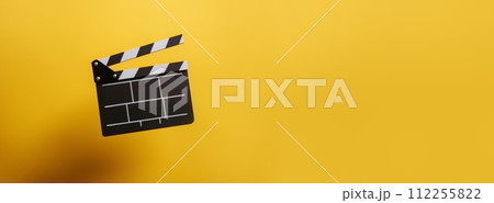 AI-generated content. Clapperboard, movie slate, used in film production and cinema, movies industry isolated over bright yellow background 112255822