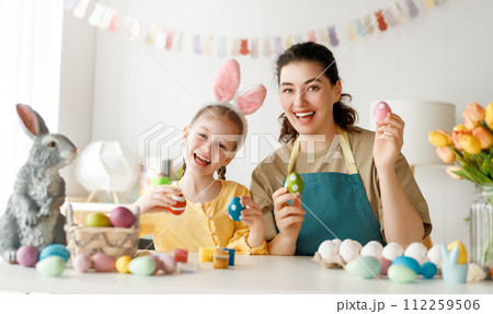family preparing for Easter 112259506