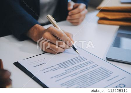 Consultation and conference of Male lawyers and professional businesswoman working and discussion having at law firm in office. Concepts of law, Judge gavel with scales of justice. 112259512