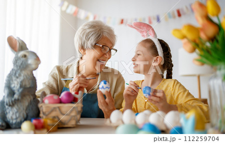 family preparing for Easter 112259704