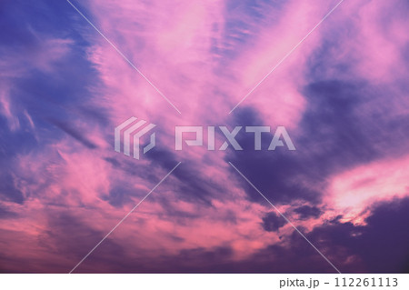 Beautiful purple pink cloudy sky at sunset. Sky texture, abstract nature background 112261113