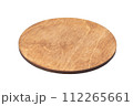 Wooden round brown tray top view. Wooden stand for hot. Isolated on a white background. Close-up. 112265661