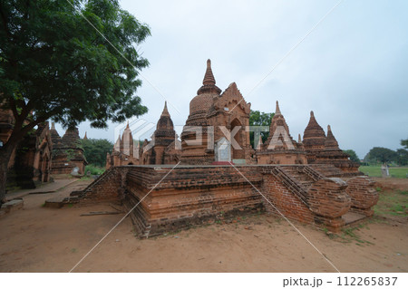 Burmese temples of Bagan City from a balloon, unesco world heritage with forest trees, Myanmar or Burma. Tourist destination. 112265837