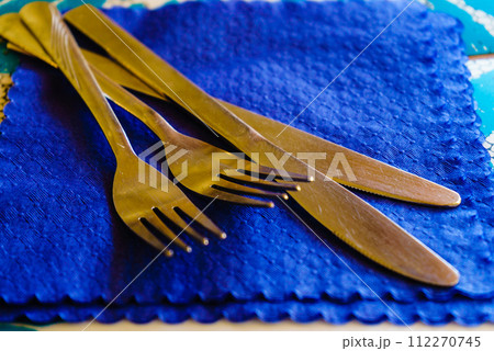 Two knifes and forks on handkerchief 112270745