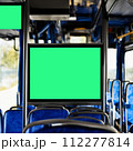 information board in the bus cabin. selective focus. advertising in public transport. screen on the bus, a place for advertising. 112277814