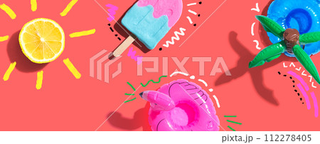 Summer concept with a flamingo float, lemon sunlight and a popsicle Summer concept with a flamingo float, lemon sunlight and a popsicle 112278405