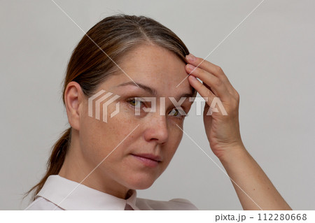 Portrait of caucasian middle aged beautiful woman of 40s with grey hair on white background 112280668