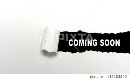 Ripped paper with 'coming soon' text Ripped paper with 'coming soon' text 112283290