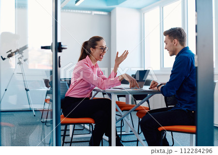 A furious business director of a startup office berating her employee for business mistakes and errors A furious business director of a startup office berating her employee for business mistakes and errors 112284296