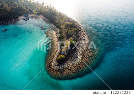 Island and blue water in tropical summer Island and blue water in tropical summer 112285228