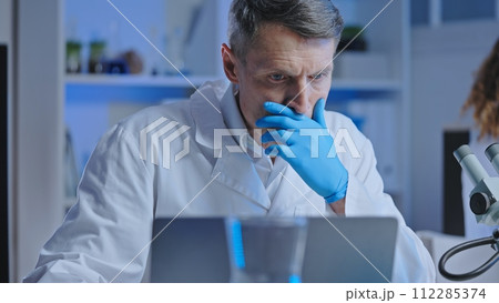 Scientist shocked by results of experiment on computer, biological weapon lab 112285374