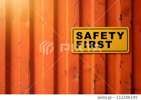 Yellow sign with 'safety first' text Yellow sign with 'safety first' text 112286195