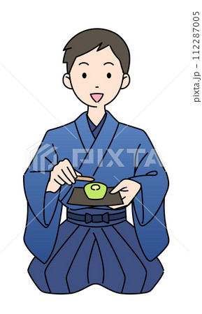 茶道　正座で茶菓子を持つ着物の男性 112287005