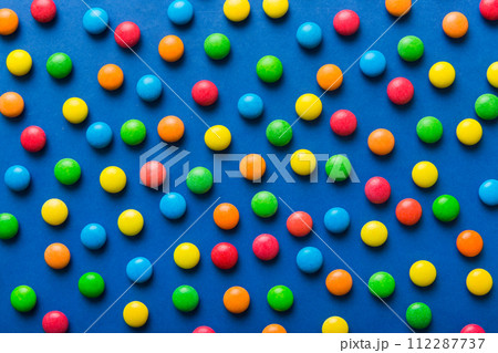 colorful candies as background top view. Seamless pattern with candy. Many sweet candies close-up 112287737