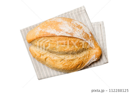 Fresh Homemade Whole Wheat Bread. bread on napkin isolated on white background, fresh bread top view 112288125