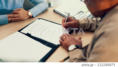 Hands, lawyer or man with contract for signature, application and writing on document of insurance or legal paperwork. Attorney or notary with client for agreement of document, policy or title deed Hands, lawyer or man with contract for signature, application and writing on document of insurance or legal paperwork. Attorney or notary with client for agreement of document, policy or title deed 112288873