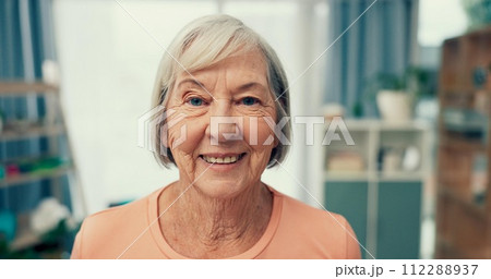 Elderly woman and portrait with wellness at nursing home for retirement with weekend break and healthy. Pensioner, face or old person with positive mindset with smile for peace in apartment for calm 112288937