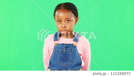 Sad, expression and face of a child on a green screen isolated on a studio background. Depression, unhappy and portrait of an African girl kid looking moody, disappointed and expressing sadness Sad, expression and face of a child on a green screen isolated on a studio background. Depression, unhappy and portrait of an African girl kid looking moody, disappointed and expressing sadness 112289072