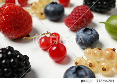 Ripe berries on the table on a light background. 112290264