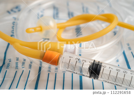 Foley urinary catheter with urine bag for disability or patient in hospital. Foley urinary catheter with urine bag for disability or patient in hospital. 112291658