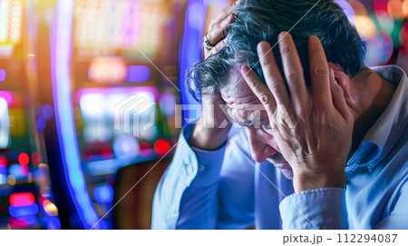 Man Feeling Upset at Casino 112294087