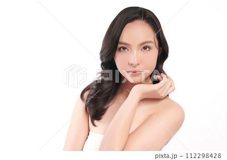 Beautiful young asian woman with clean fresh skin on white background, Face care, Facial treatment, Cosmetology, beauty and spa, Asian women portrait. Beautiful young asian woman with clean fresh skin on white background, Face care, Facial treatment, Cosmetology, beauty and spa, Asian women portrait. 112298428