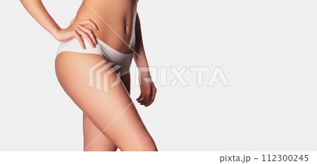 Perfect body. Slim caucasian lady posing with Perfect body. Slim caucasian lady posing with 112300245
