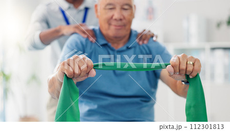 Resistance band, physical therapy and old man with physiotherapist, muscle training and strength with senior care. Health, wellness and people at physio clinic with rehabilitation and equipment 112301813