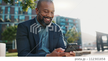 Smile, phone and African businessman in the city networking on social media, mobile app or internet. Technology, typing and professional male person scroll on website with cellphone in urban town. Smile, phone and African businessman in the city networking on social media, mobile app or internet. Technology, typing and professional male person scroll on website with cellphone in urban town. 112301858