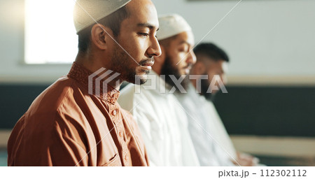 Islamic, praying and men in a Mosque for spiritual religion together as a group to worship Allah in Ramadan. Muslim, Arabic and holy people with peace or respect for gratitude, trust and hope Islamic, praying and men in a Mosque for spiritual religion together as a group to worship Allah in Ramadan. Muslim, Arabic and holy people with peace or respect for gratitude, trust and hope 112302112