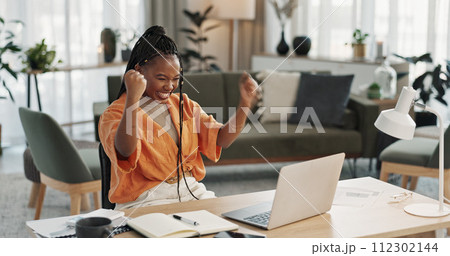 Black woman, achievement in home office and celebration at laptop for remote work, social media or excited blog. Happy girl at desk with computer for winning email, good news and success in freelance 112302144