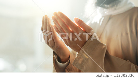 Islam, prayer and hands of man in mosque with love mindfulness and gratitude in faith for Eid. Worship, religion and Muslim person in holy temple praise, spiritual teaching and peace in ramadan. 112302336