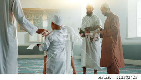 Muslim, child and men in a Mosque for spiritual religion together as a family to worship Allah in Ramadan. Islamic, Arabic and holy people with kid in peace or respect for gratitude, trust and hope 112302423
